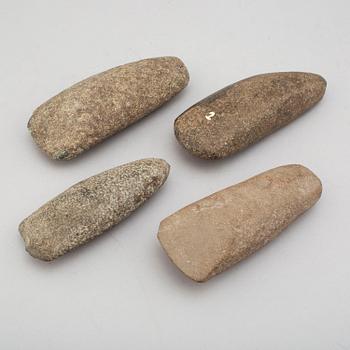 Four neolithic stone axes.