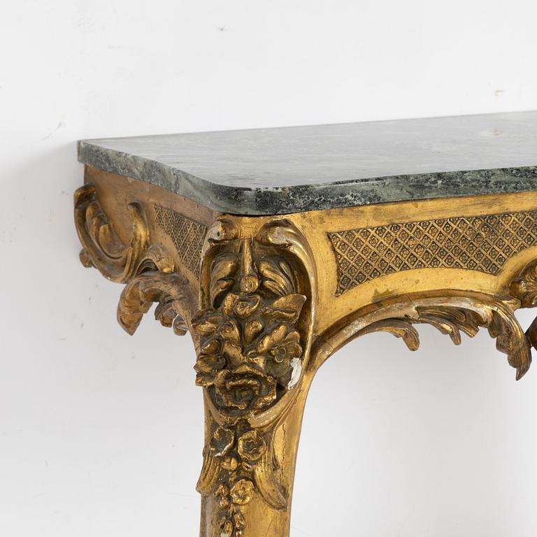 Mirror with console table, Rococo style, circa 1900.