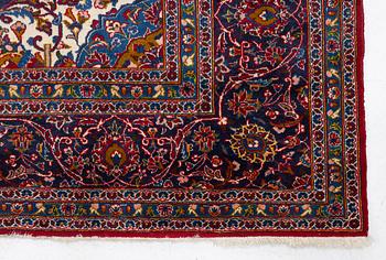 An Oriental carpet, c. 396 x 300 cm.