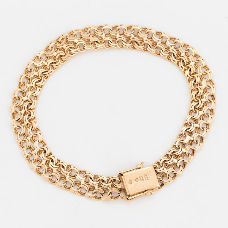 ARMBAND 18K guld.