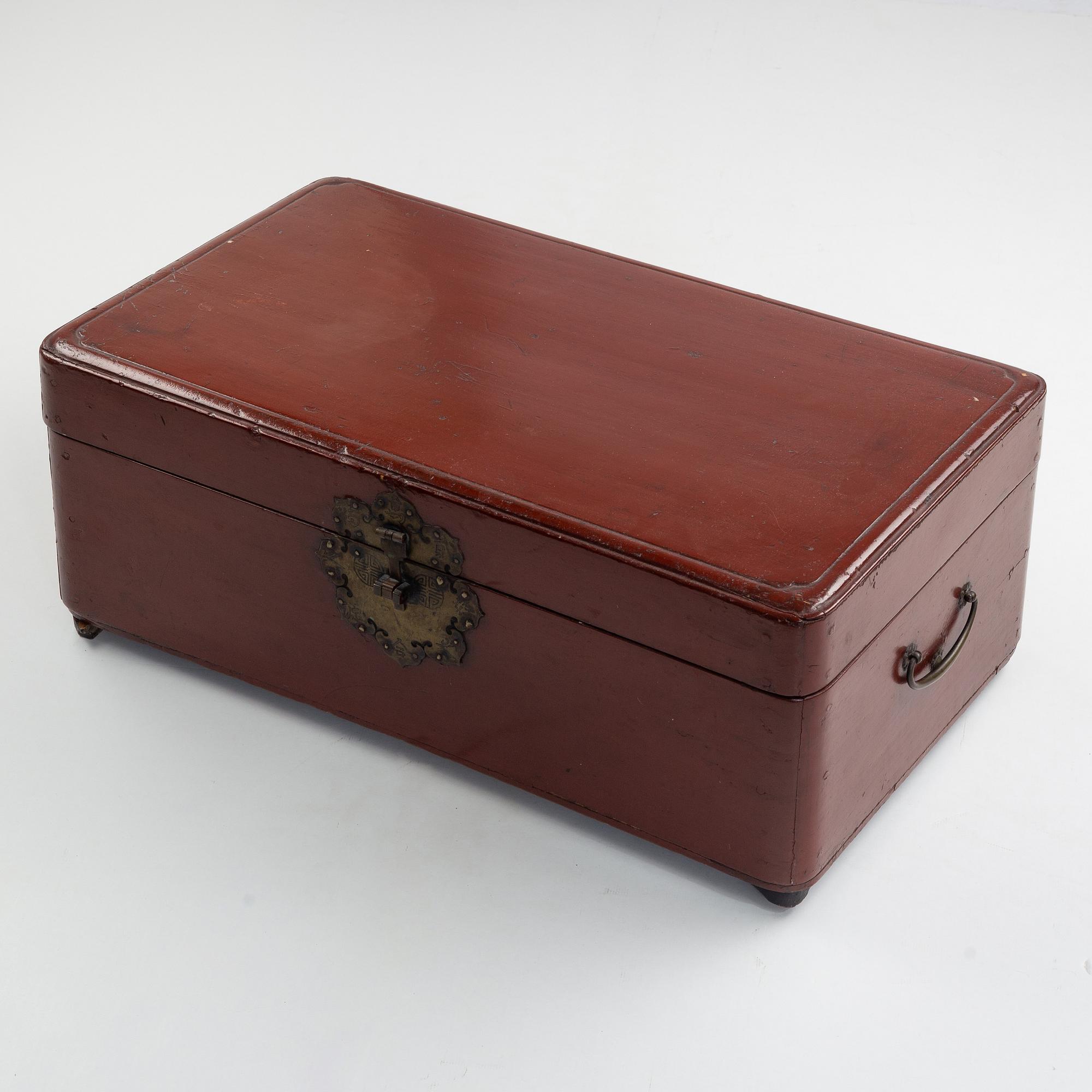 A Korean wooden wedding chest, two hats, an opium pipe, a scale, circa 1900.
