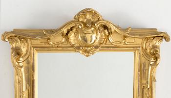 A carved gilt-wood 'Rococo' frame, possibly 18th century.