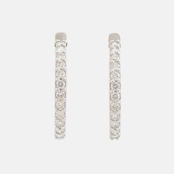 Brilliant cut diamond hoop earrings.