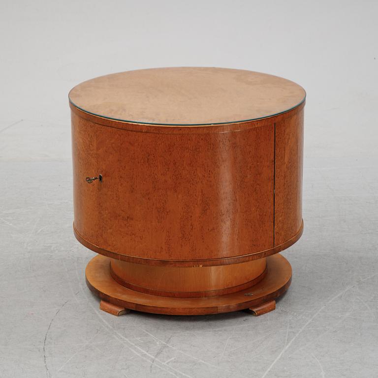 A mid 20th Century birch drinks table.