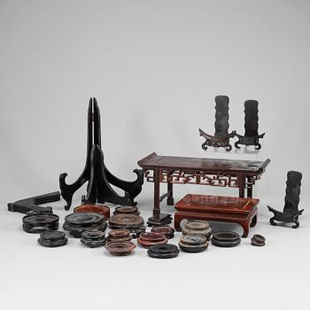 A group of Chinese wooden stands, 20th Century. (20 pieces).