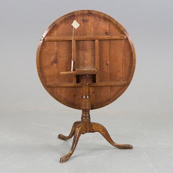 A early 1800's birch folding table.