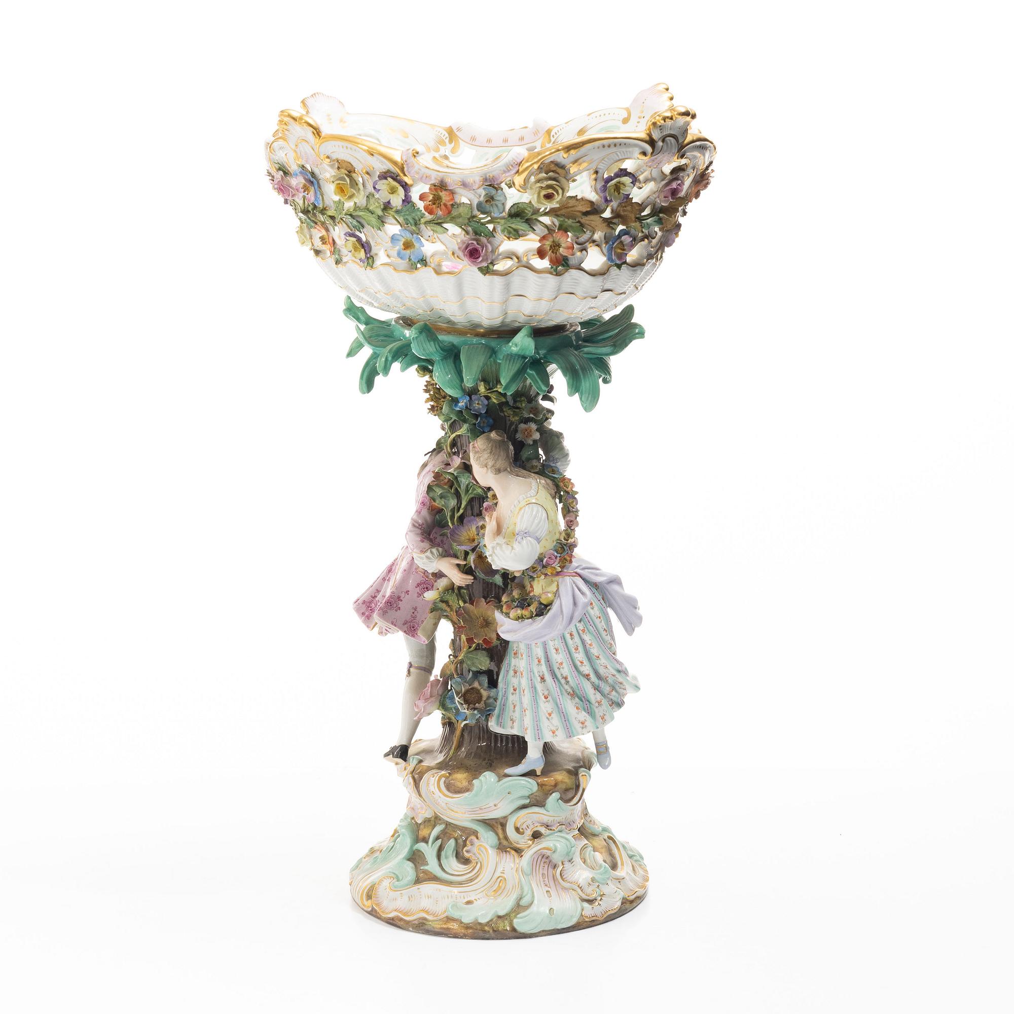 Meissen, A large polychrome reticulated porcelain basket on a pedestal with dancing figures, 19th century.