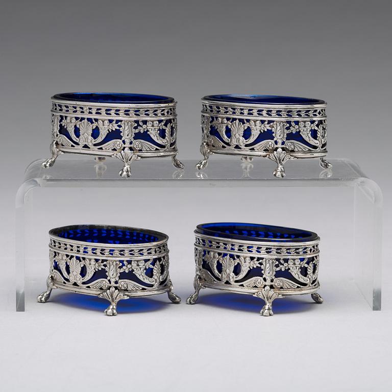 A Belgian set of four 19th century silver and glass salts, marks are Hanau Pseudo marks of "Wolf & Knell", after 1887.