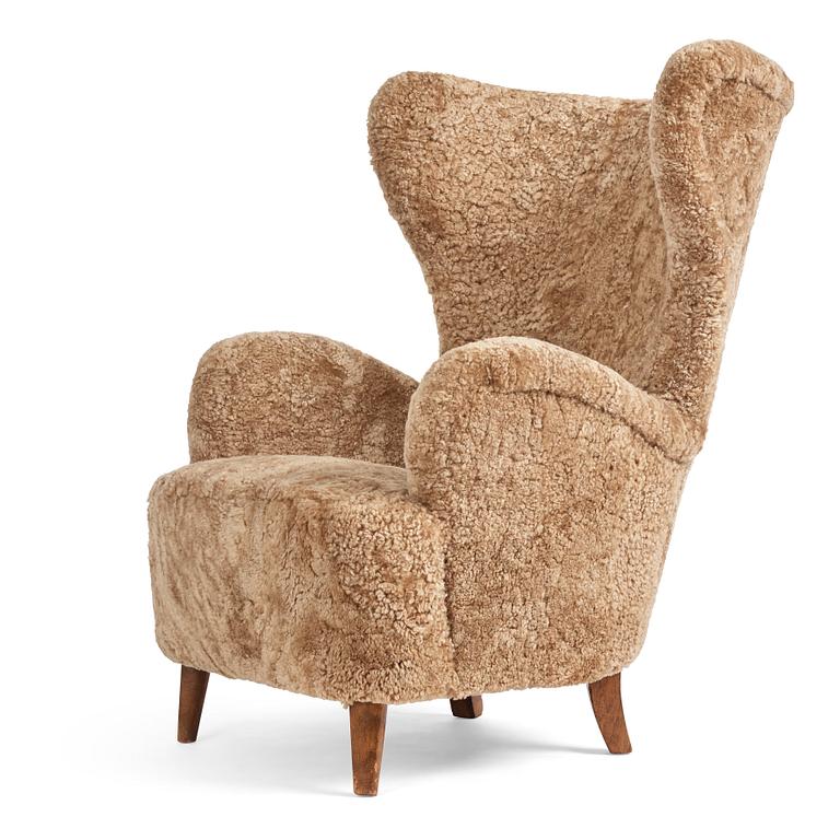 Otto Schulz, a Swedish Modern sheepskin upholstered armchair, Boet Gothenburg 1940s.