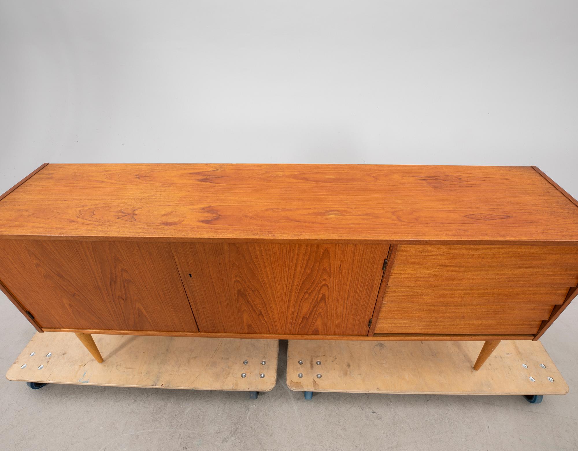 A 1960s teak sideboard.