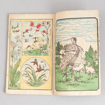 A group of five Japanese albums, including Katsushika Isai and Utagawa Kunisada, Meiji (1868-1912).