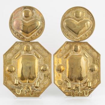 A pair of baroque style brass sconces, around 1900.