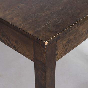 A Finnish 1930s dining table and eight chairs.
