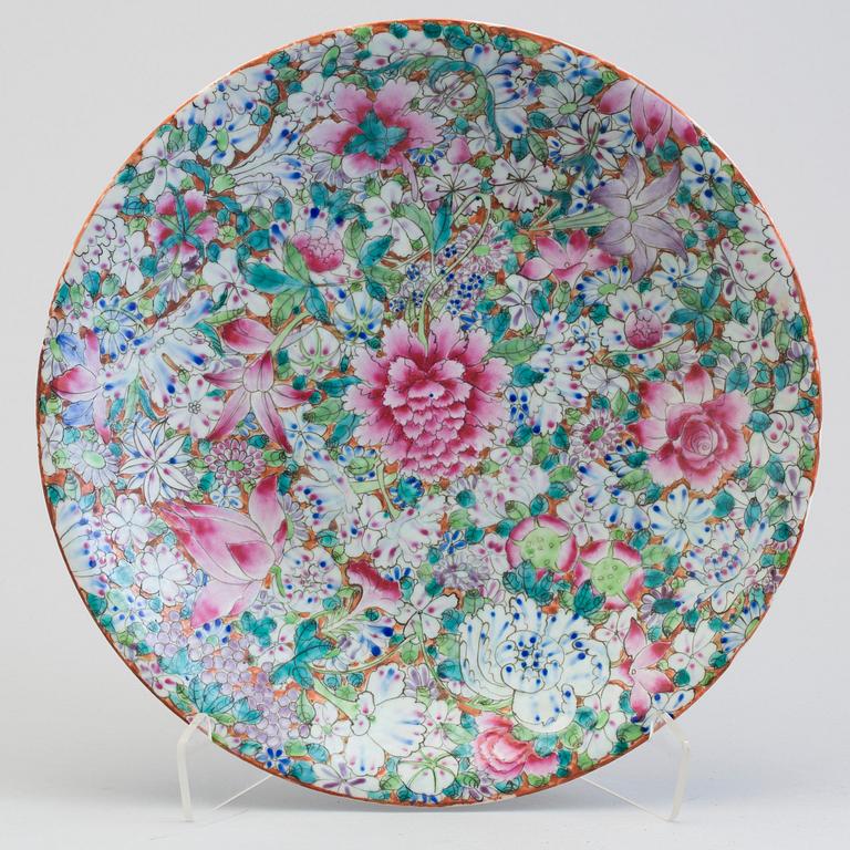 A Chinese early 20th century mille fleur famille rose porcelain dish.