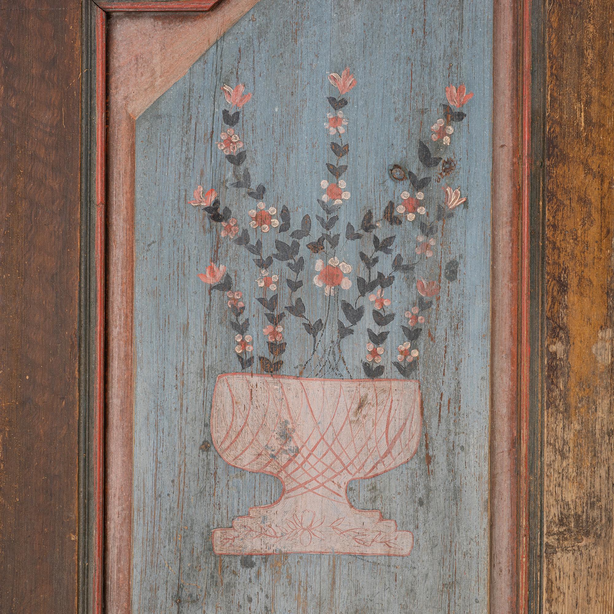 A folk-art cabinet attributed to  "Gammelmålaren" Anders Nilsson (Brunskog, 1807–1889).