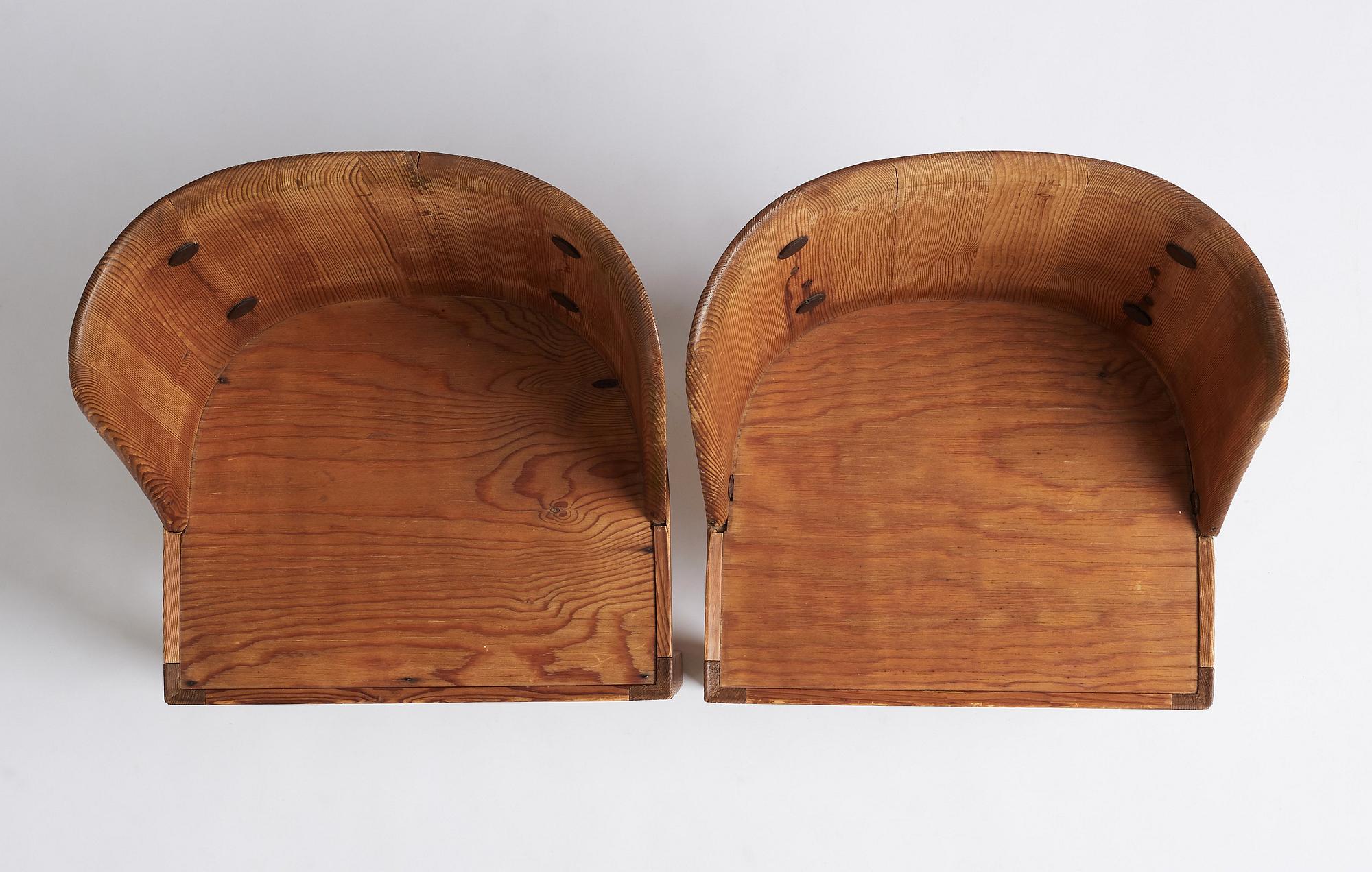 Axel Einar Hjorth, a pair of stained pine 'Lovö' chairs, Nordiska Kompaniet Sweden 1930s.