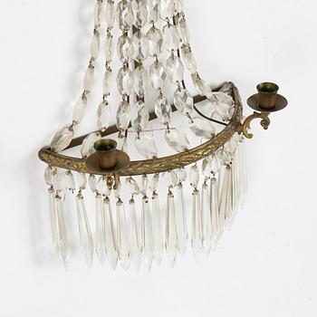 A pair of Gustavian style wall sconces, early 20th Century.