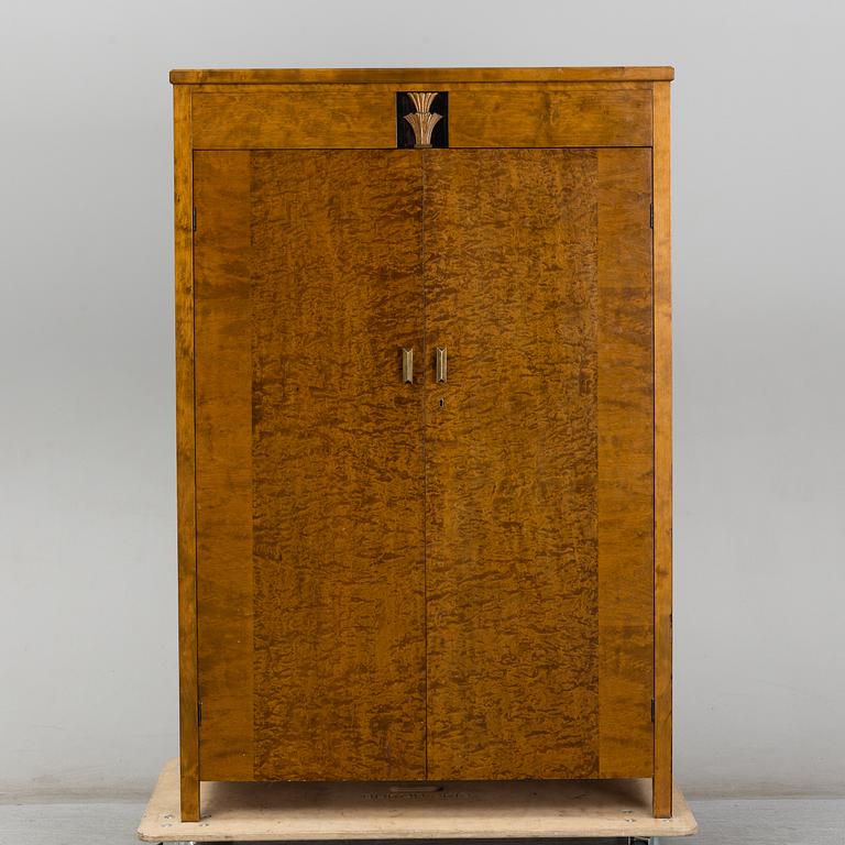 A birch venereed cabinet, 1930's.