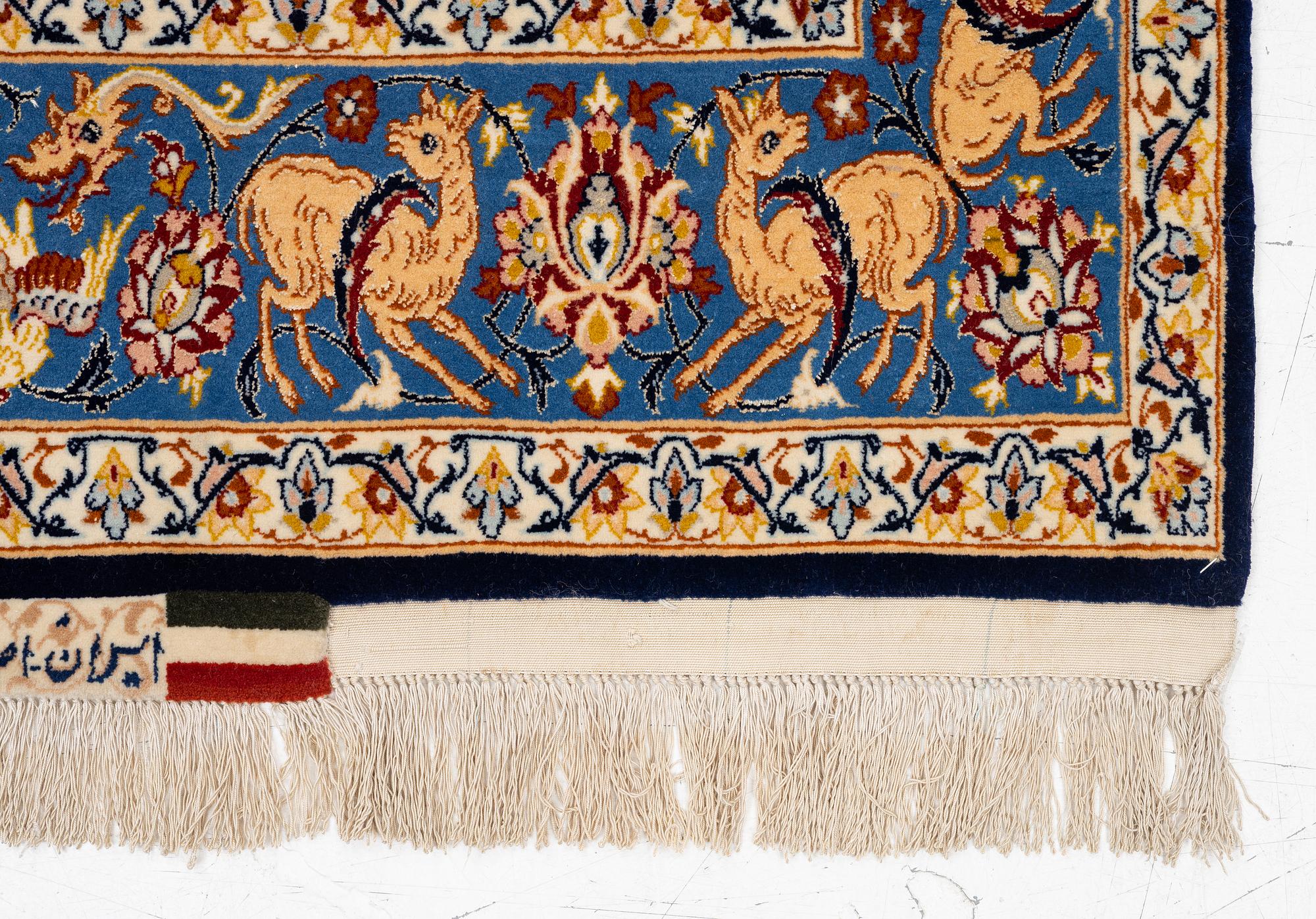 A semi-antique part silk Isfahan, signed, c. 176 x 107 cm.