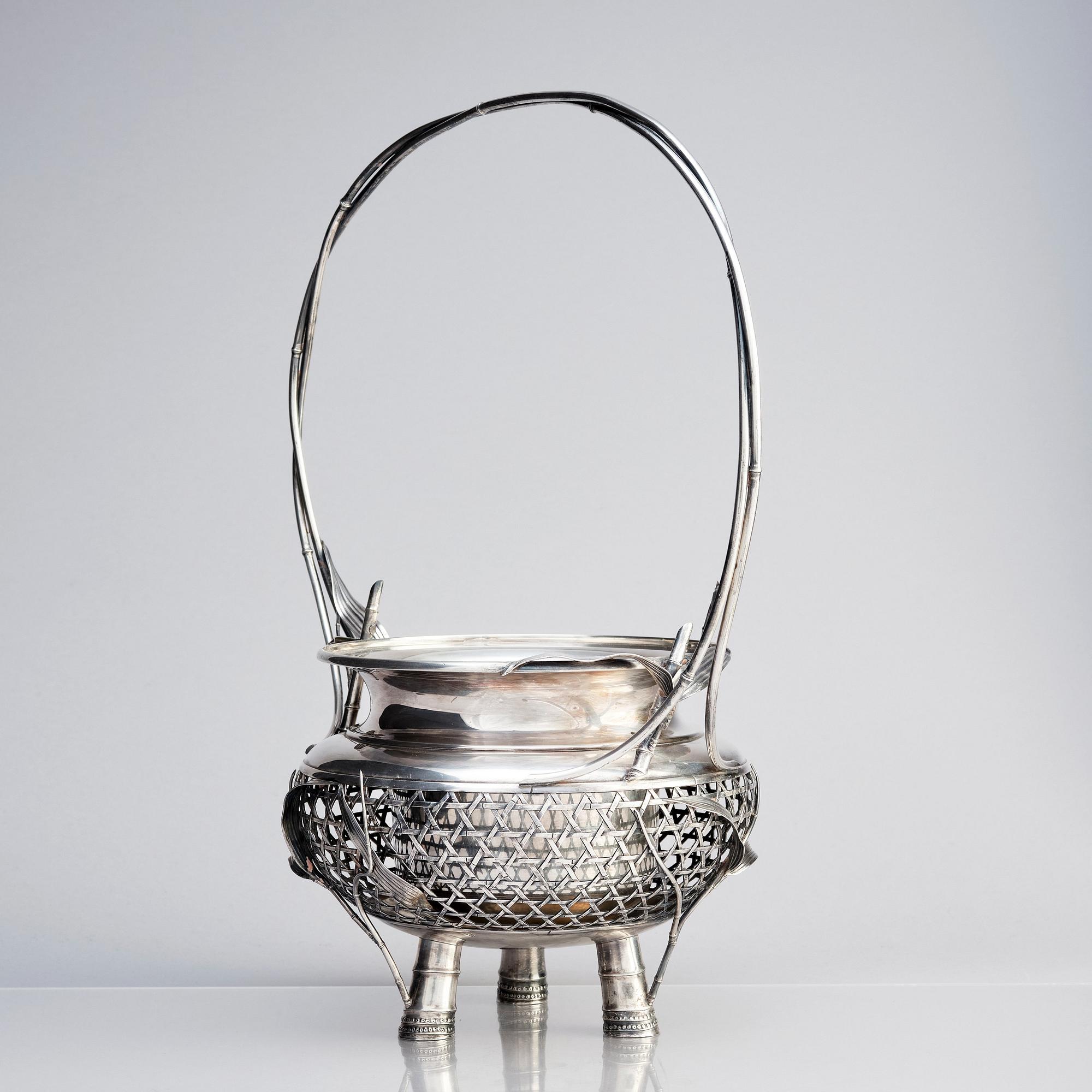 A Japanese silver basket, early 20th Century.