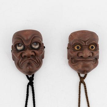 A set of two Japanese miniature noo masks, Meiji period (1868-1912).