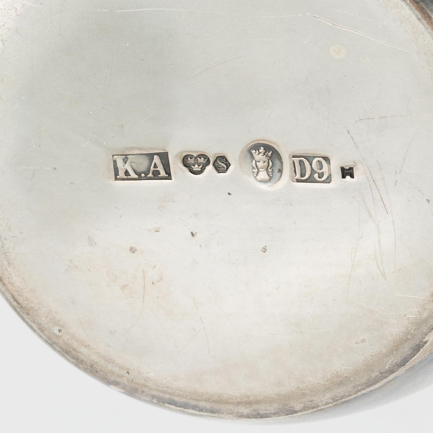 Three silver bowls and creamer, Sweden and Germany, 20th century.
