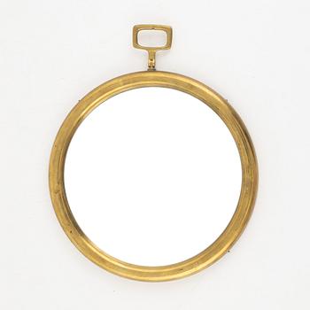 Josef Frank, or Estrid Ericson, a brass mirror, model "H2672", Firma Svenskt Tenn, Sweden 1950s-60s.