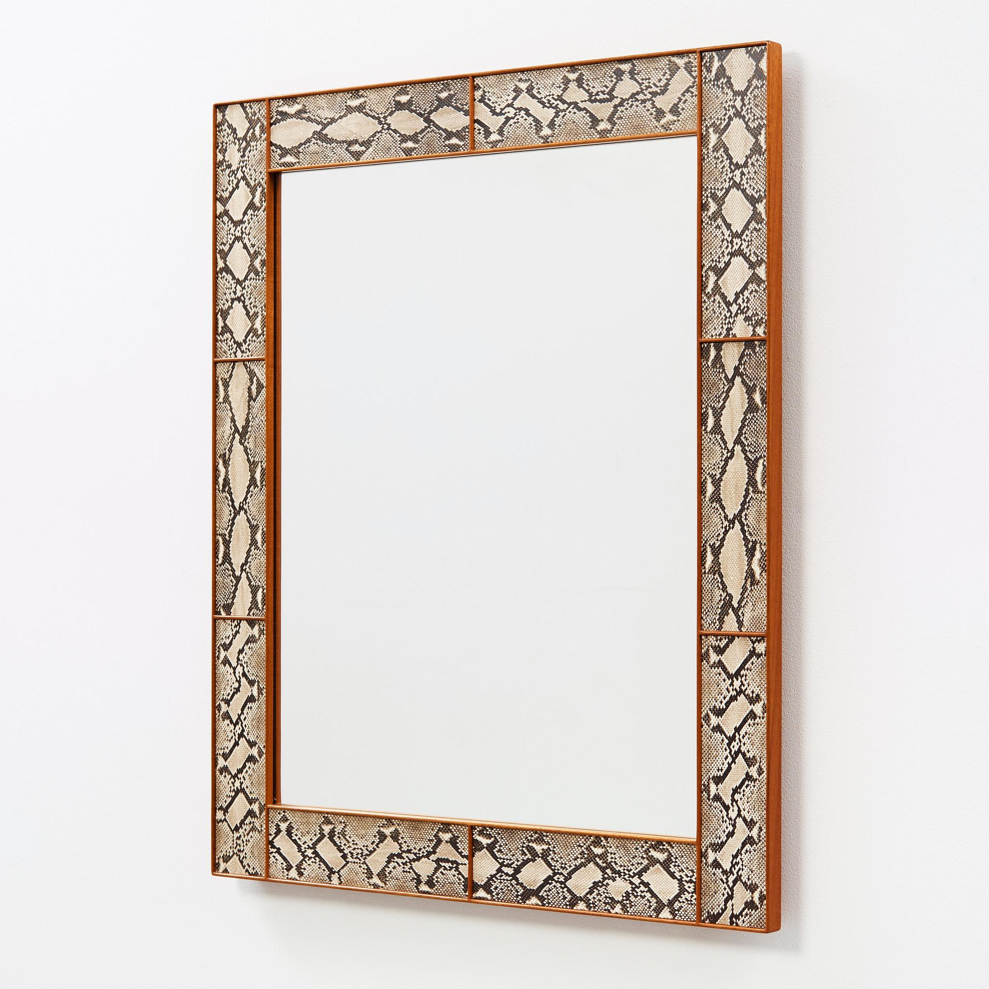 Josef Frank, A Josef Frank faux snakeskin mahoganyframed wall mirror, Svensk Tenn, Sweden 1950-60's.