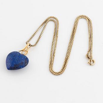 Lapis lazuli and white stone heart pendant.