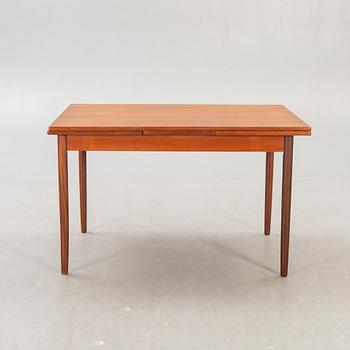 A Danish 1960s teak dining table.