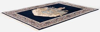 A semi-antique pictoral 'Lion and Sun' Kerman rug, c. 205 x 144 cm.