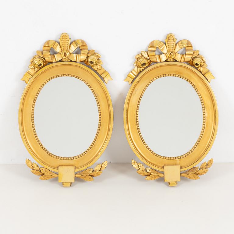 A pair of Gustavian style mirrors, 20th Century.