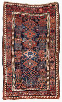 An antique Kurdish / Turkish carpet by the Herki Tribe, c 233 x 137 cm.