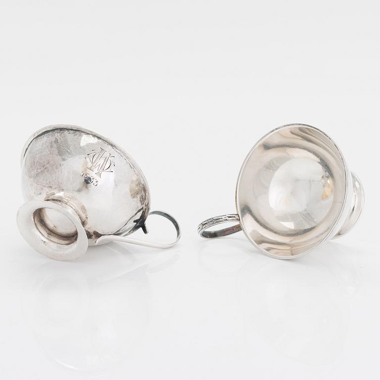 Two sterling silver bowls, Gustav Jansson 1955, 1960, and eight similar silver punsch cups, GAB and CGH 1933-41. Sweden.