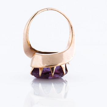 A amethyst ring.