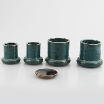 Marianne Westman, four stoneware vases and a tray/stand, Rörstrand, Sweden.