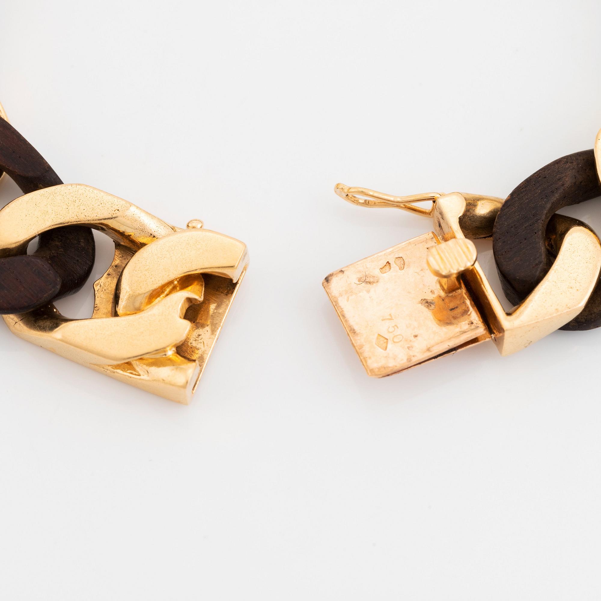 A Van Cleef & Arpels 18K gold and wood bracelet.