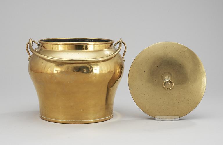 A Skultuna brass pot with cover, dated 1860.