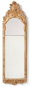 104. A Swedish Rococco mirror, late 18th century.