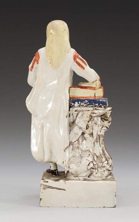 A creamware figure, presumably England, 18th Century.