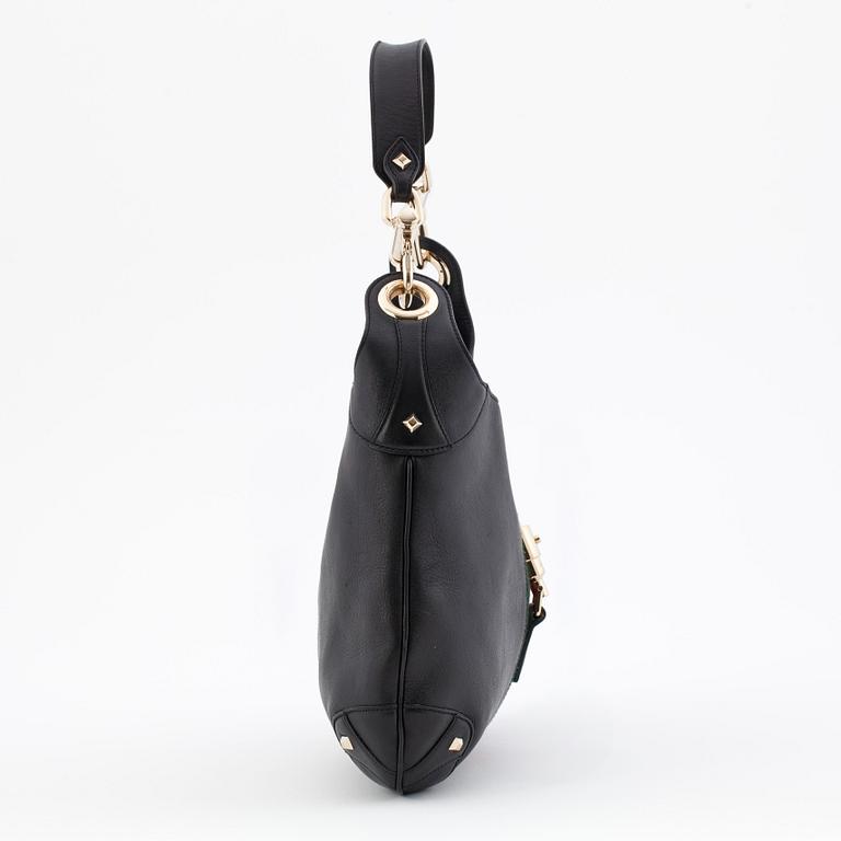 GUCCI, a black leather shoulder bag, "Jackie".