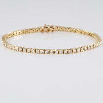 ARMBAND, 18K guld med briljantslipade diamanter ca 2.71 ct. Vikt  10,0 gram.