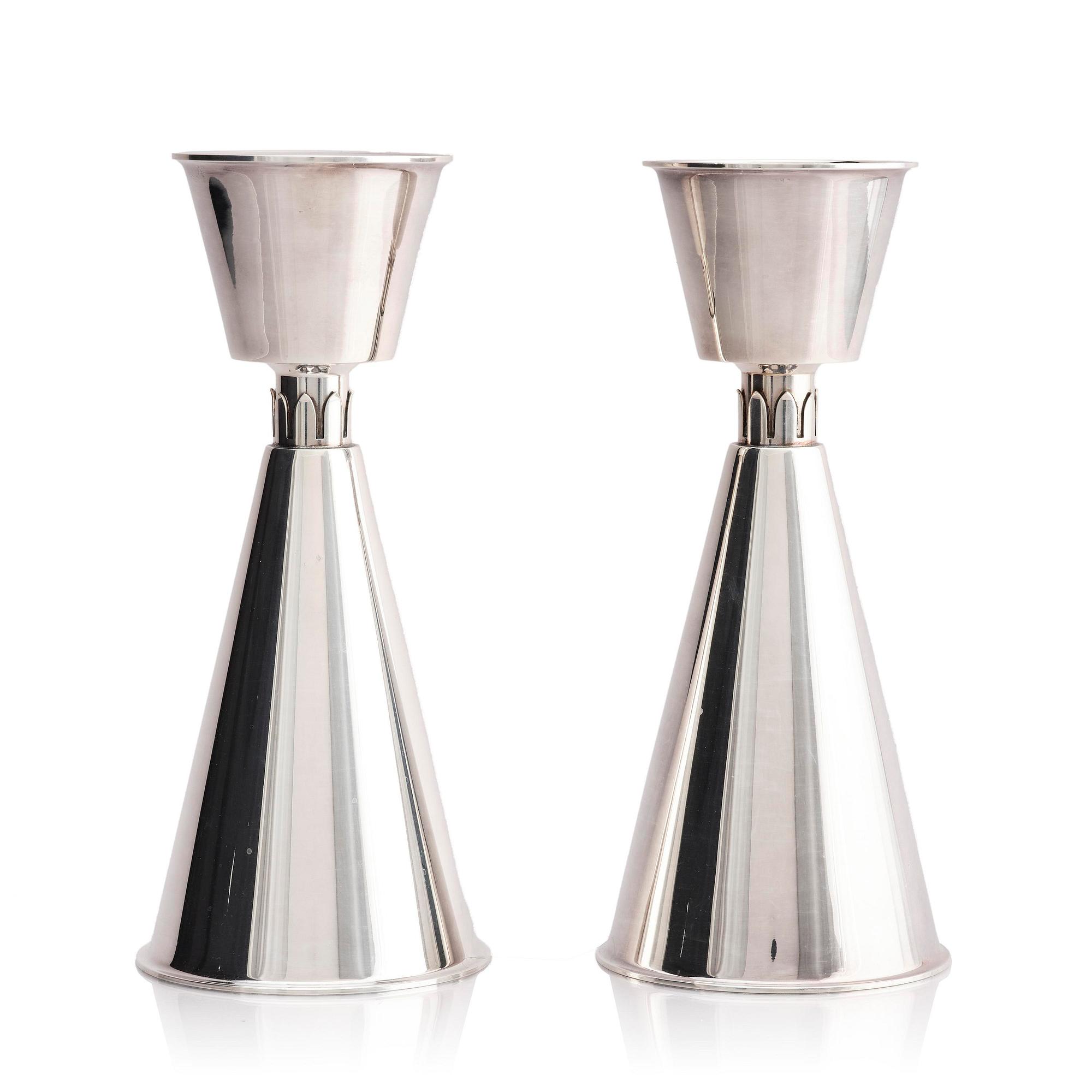 Guldsmedsaktiebolaget (GAB), a pair of sterling silver candlesticks, design Vera Ferngren, Stockholm, Sweden 1968.