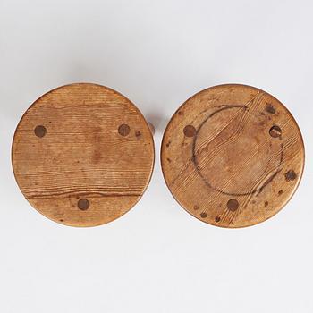 Axel Einar Hjorth, a pair of "Skoga" stained pine stools, Nordiska Kompaniet 1930s.