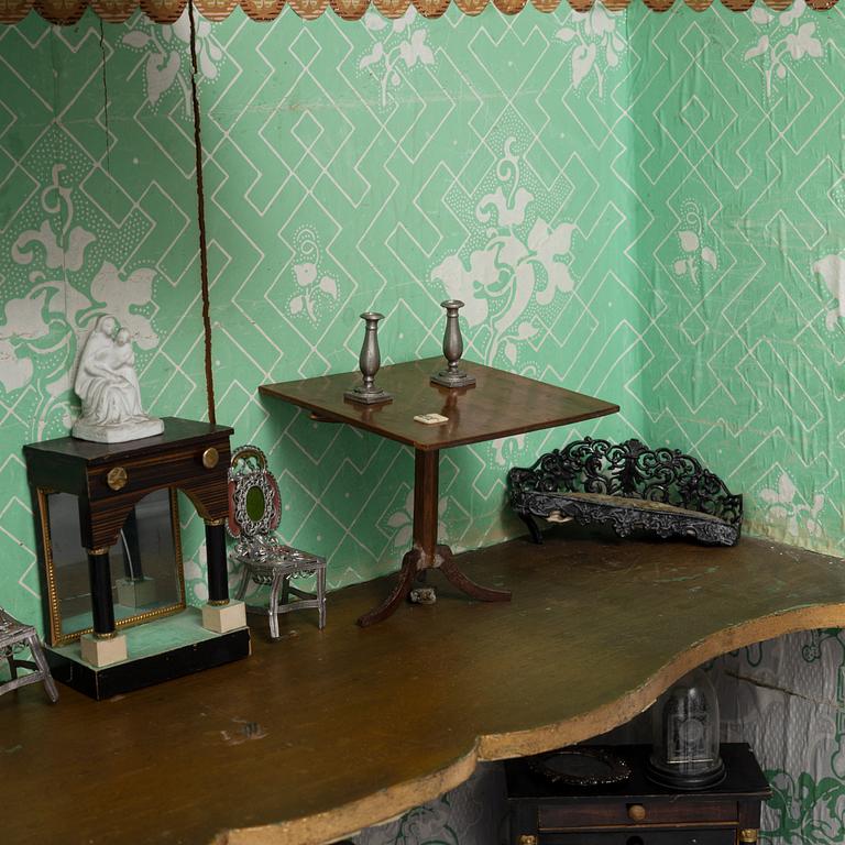 An 18th century cabinet / doll's house.