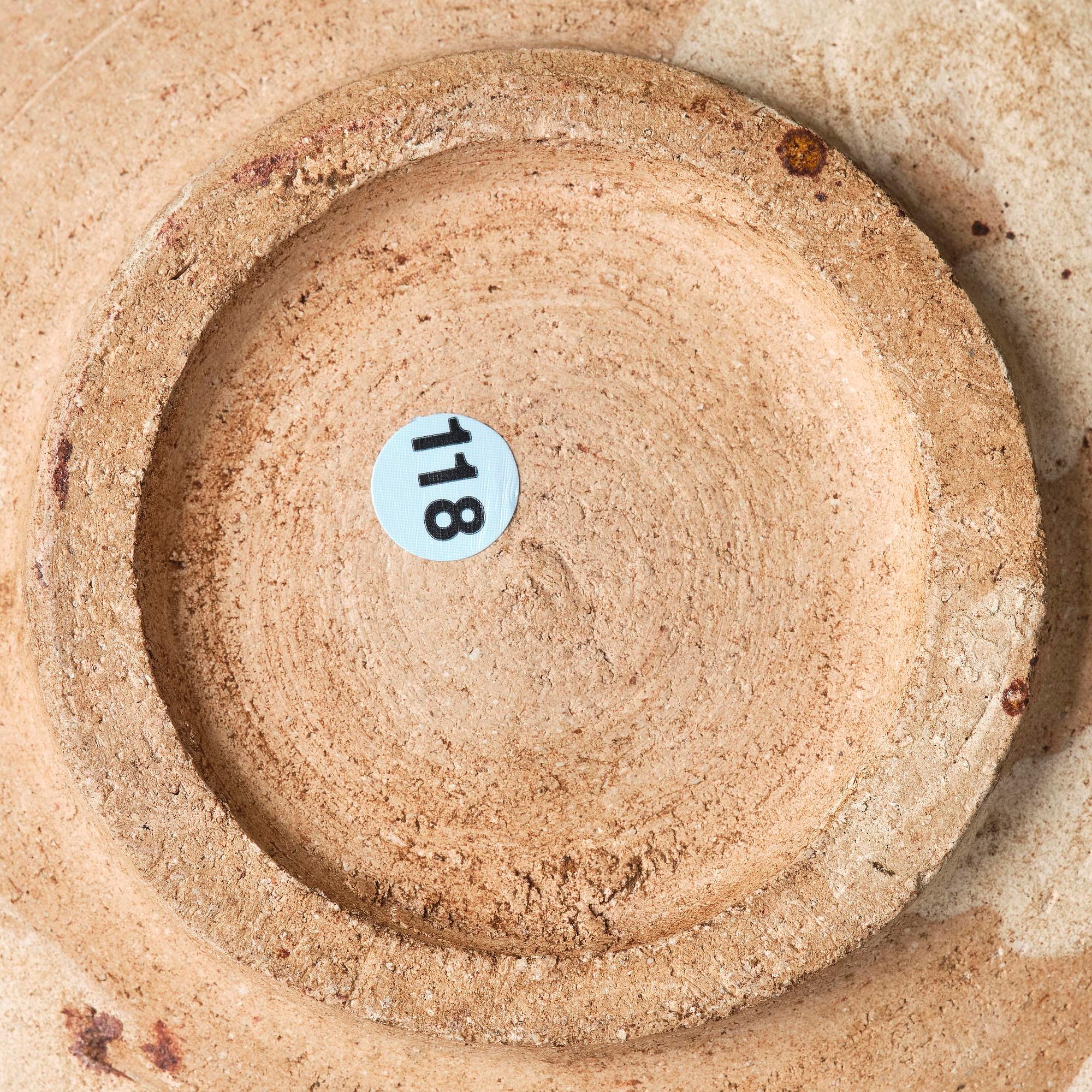 A yellow glazed dish, Liao dynasty (907–1125).