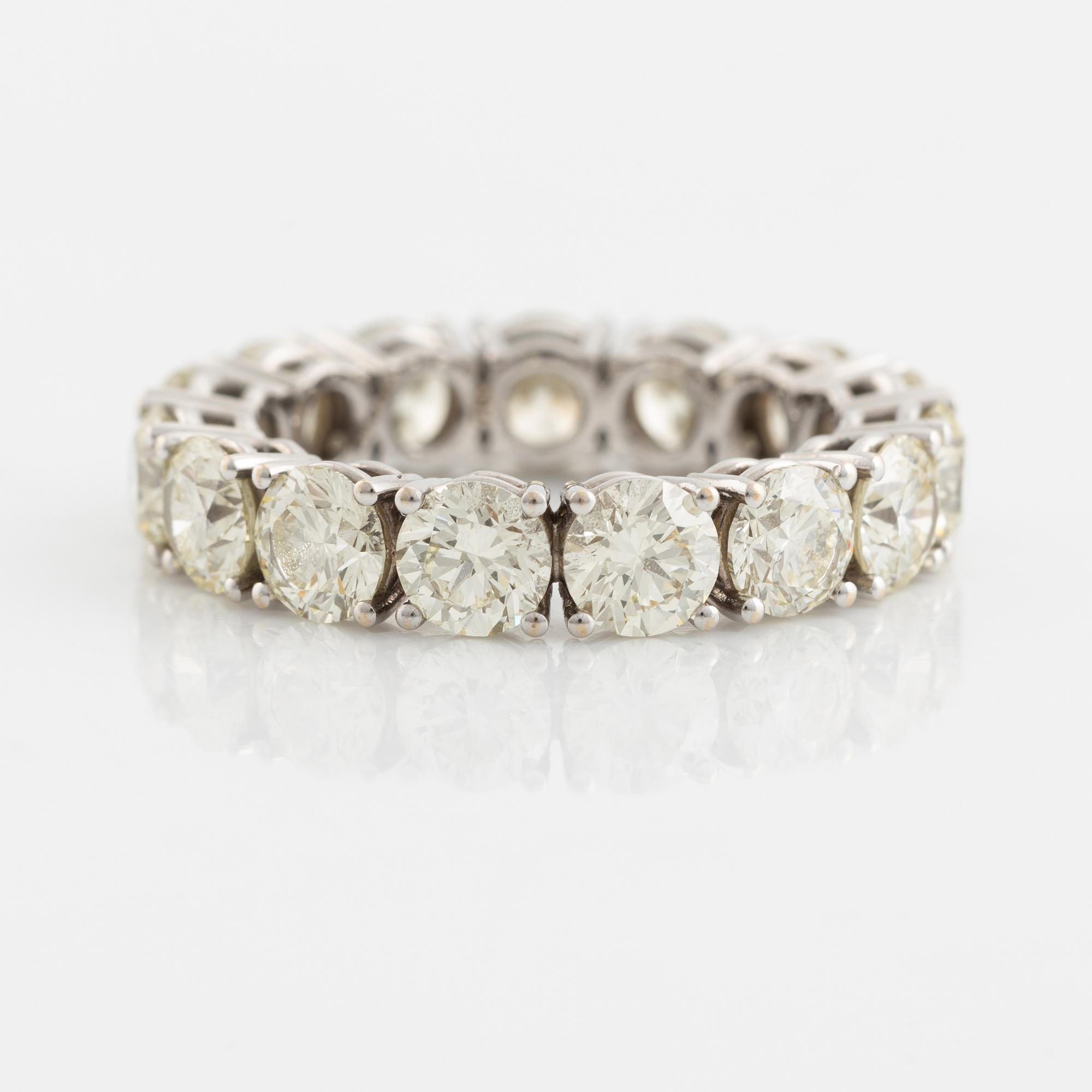 Brilliant cut diamond eternity ring.