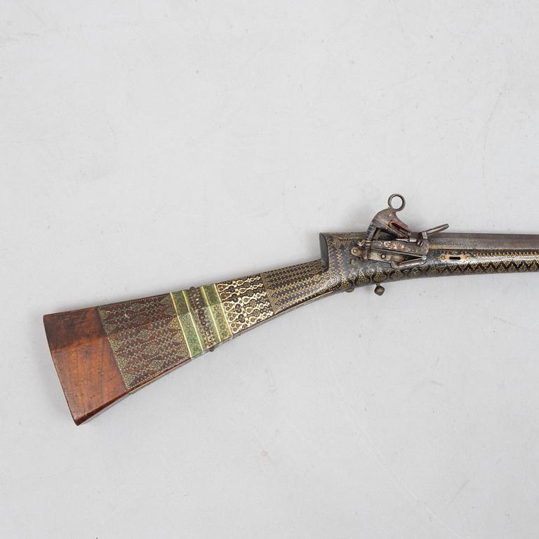 A Persian snaphaunce rifle, 18th century.