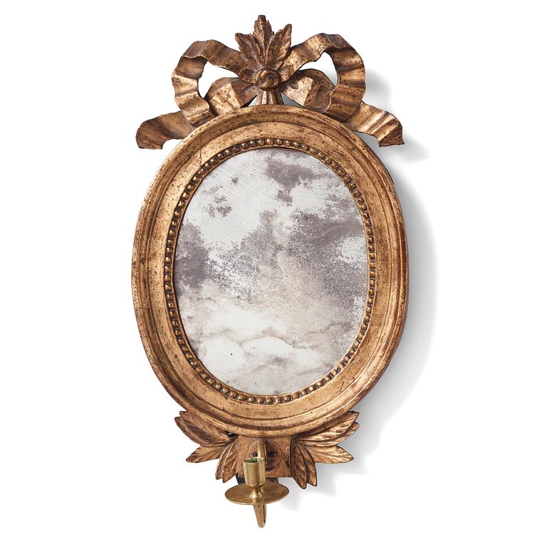 A pair of Gustavian late 18th century one-light girandole mirrors.