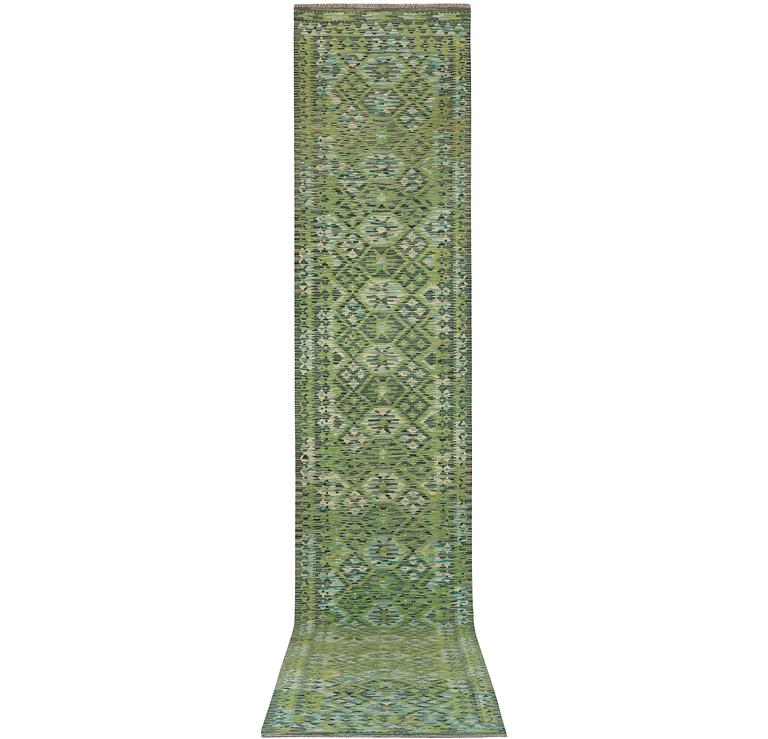 An Afghan kilim runner, c. 488 x 79 cm.